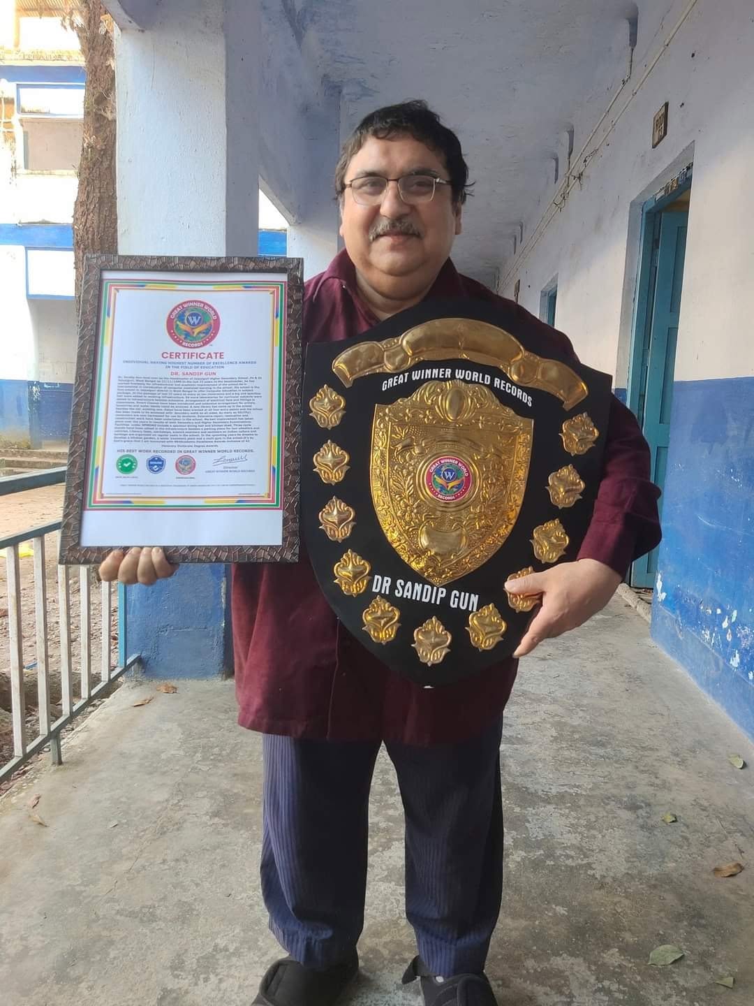 Dr. Sandip Gun with GWWR Shield